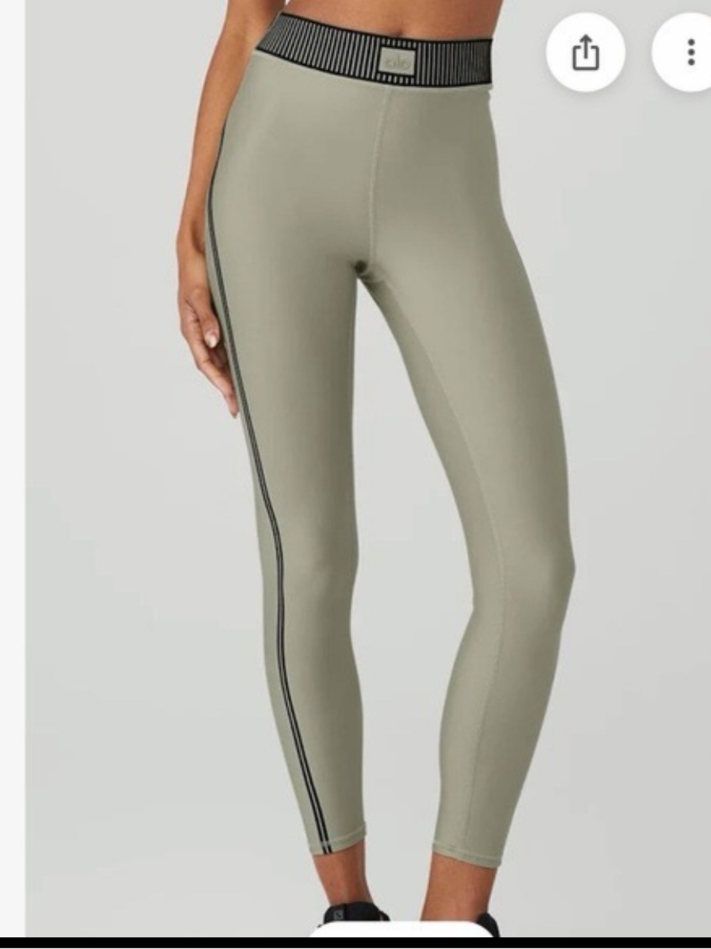 ALO Yoga sage green high-waist leggings with black striped waist